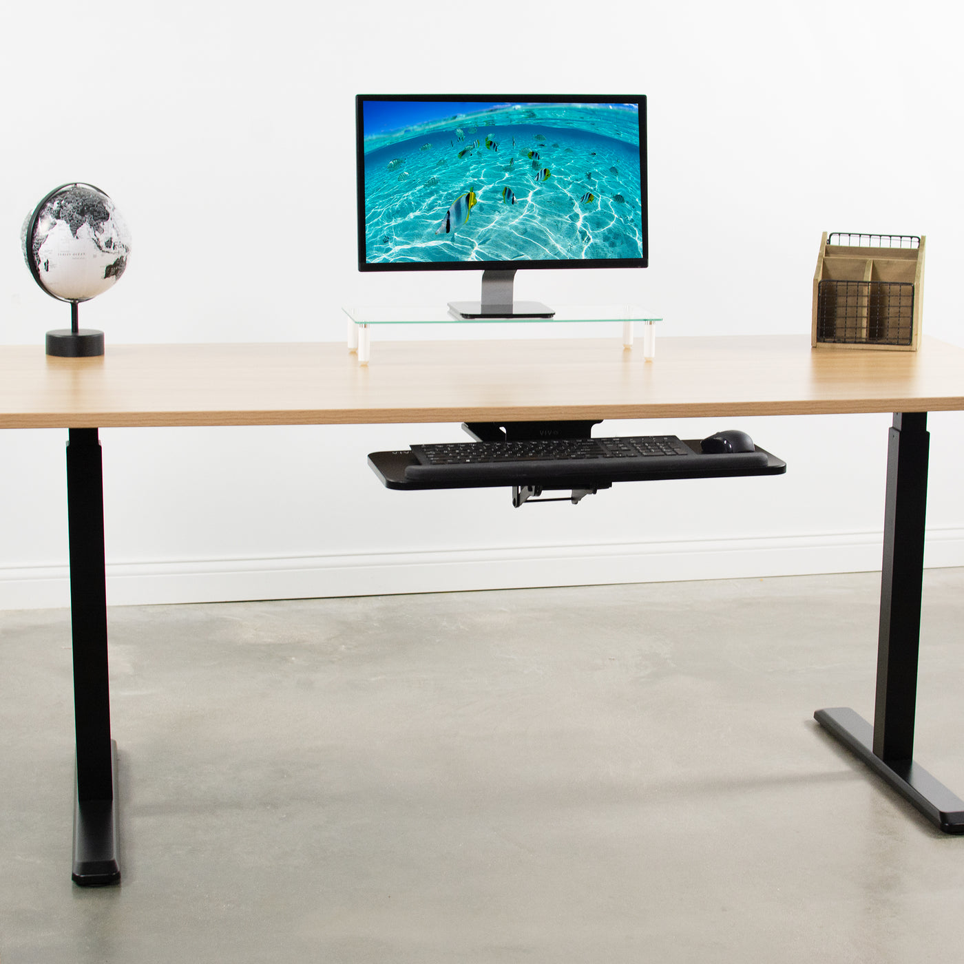 Sliding under desk mount keyboard tray on sit-to-stand ergonomic VIVO desk.