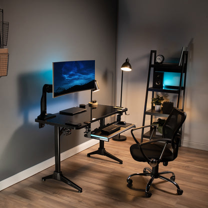 Teal LED sliding under-desk keyboard tray in a modern matching office.