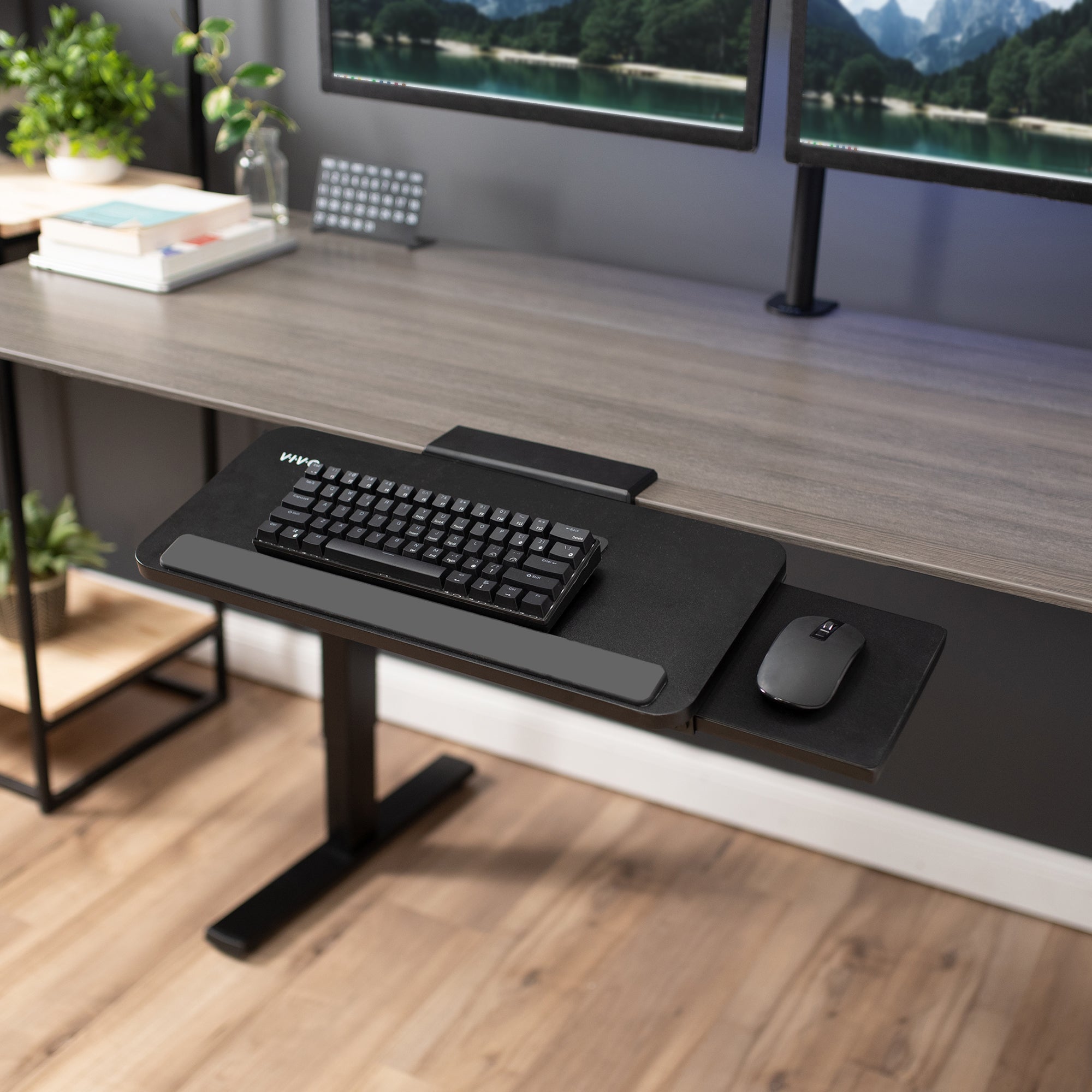 Space-saving adjustable under desk keyboard tray with mousepad.