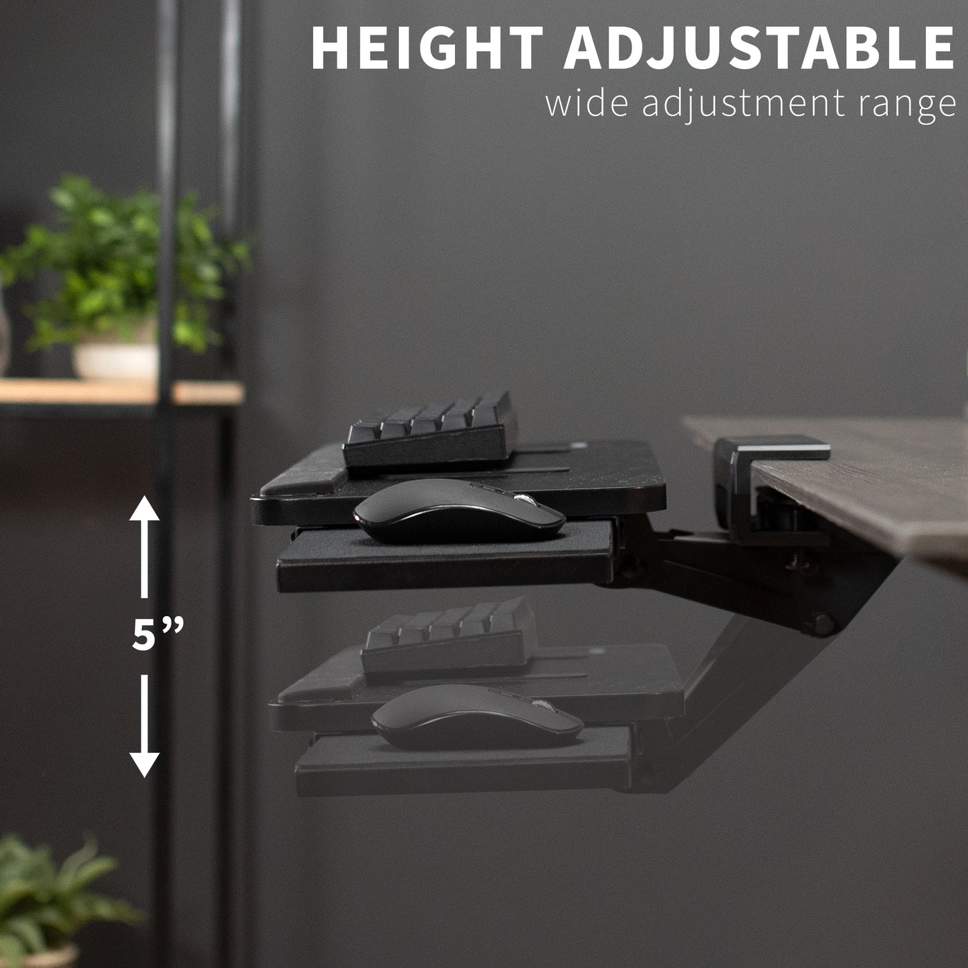 Height adjustable under desk keyboard tray with mousepad.