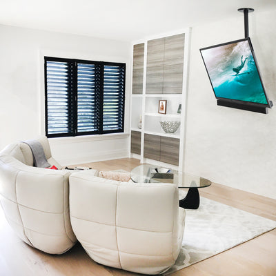 Heavy-duty height adjustable TV ceiling mount and soundbar bracket for enhanced audio speaker system.