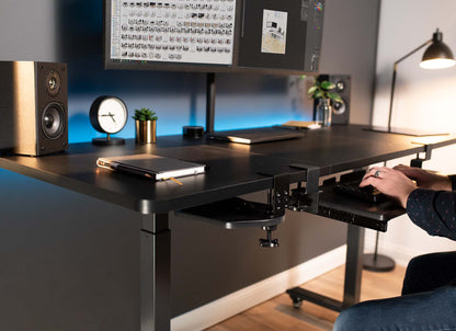 Ergonomic office set up with an attackable mouse and keyboard tray.