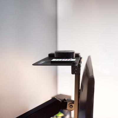 Ergonomic VESA monitor shelf with solid steel mount brackets with over or under desk application.
