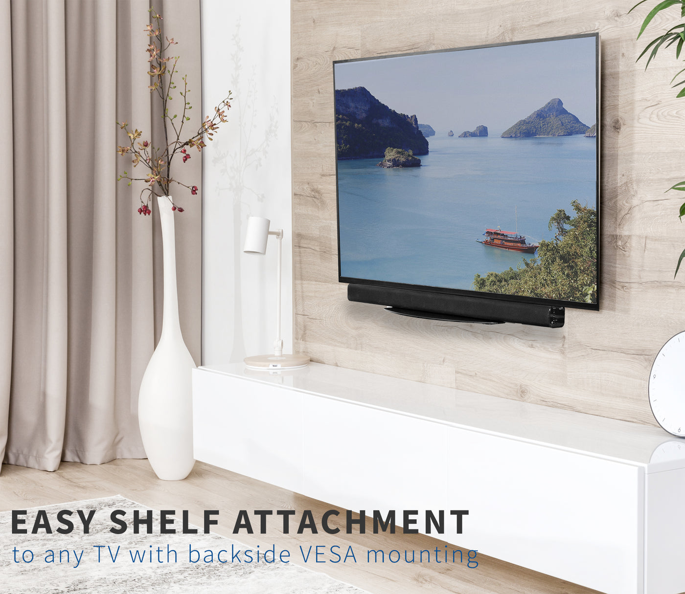 Sturdy over/under-glass shelf with support holding a large soundbar below the TV screen.