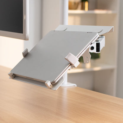 Heavy-duty VESA compatible laptop holder.