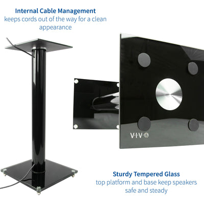 Heavy-duty speaker stands for surround sound speakers with cable management.
