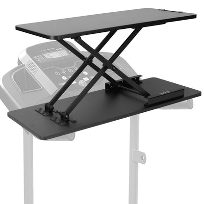 Extending treadmill desk converter.