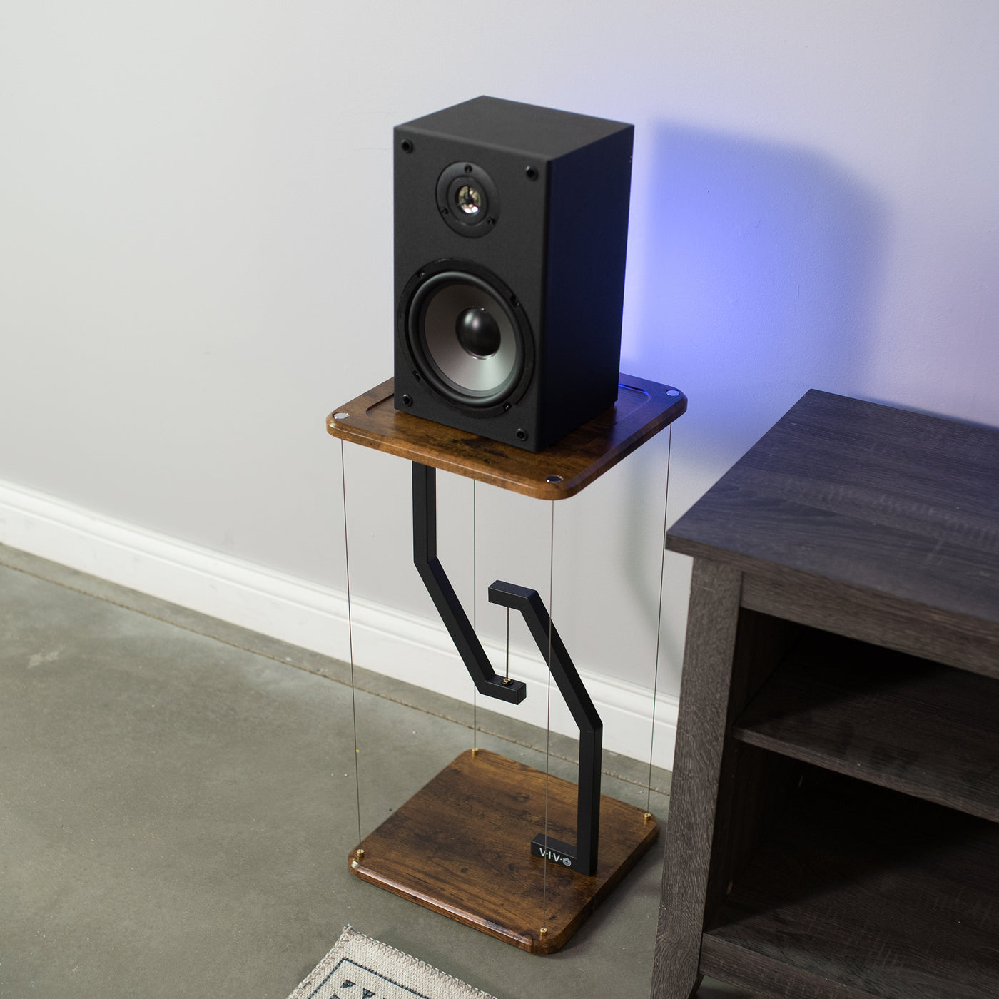 Rustic floating tensegrity speaker floor stand for enhanced sound system.