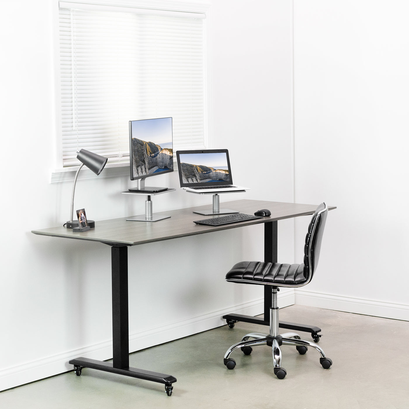 Clamp on desk risers that can elevate speakers, laptops, monitors, lamps, and more.