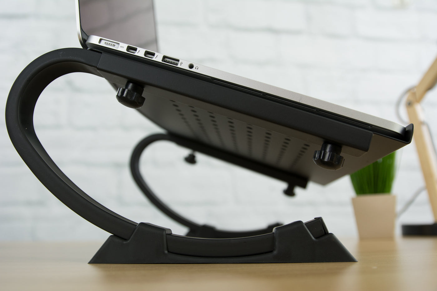 VIVO black laptop desk stand.