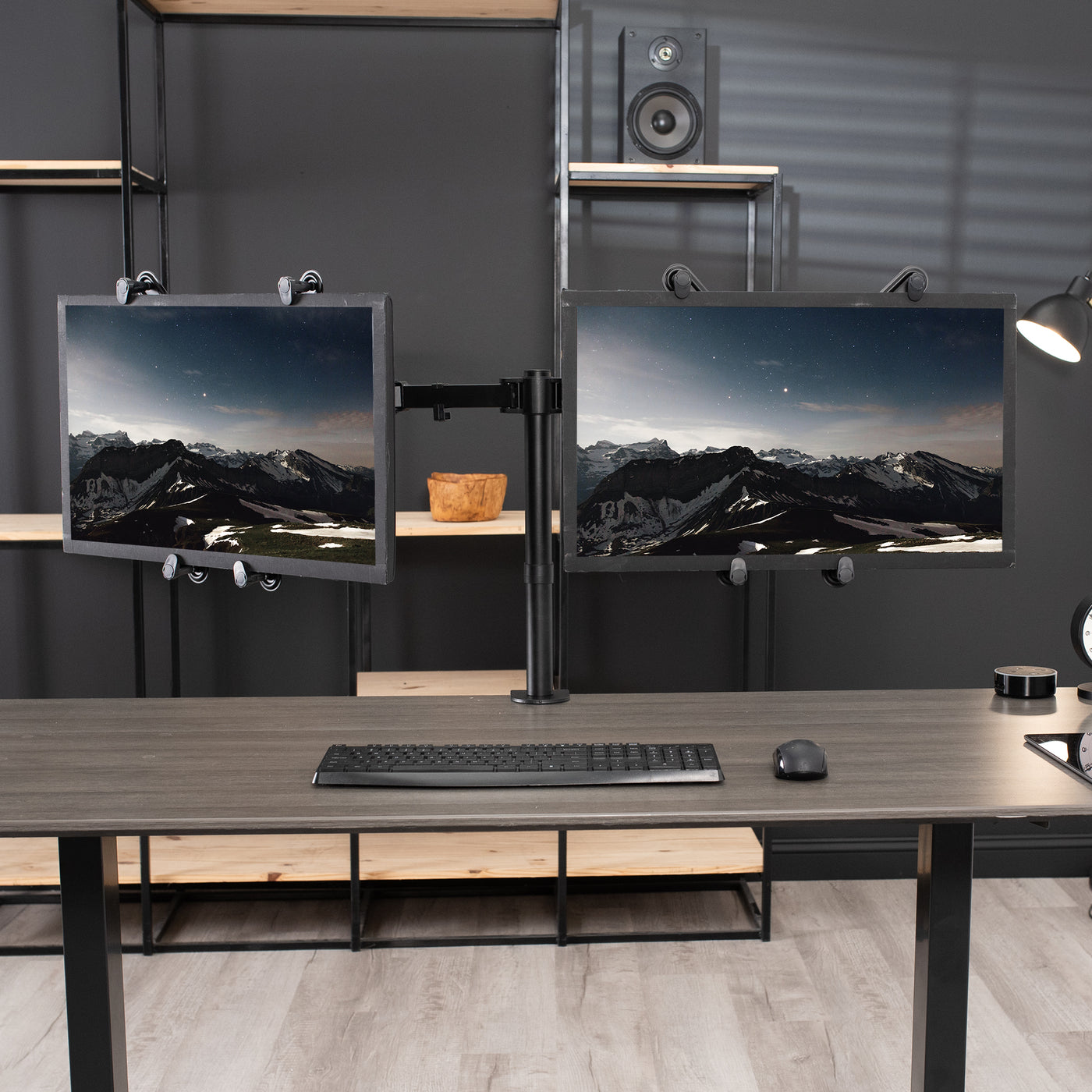 Dual monitor desk mount with VESA Adapter bracket designed for monitors lacking VESA compatibility.