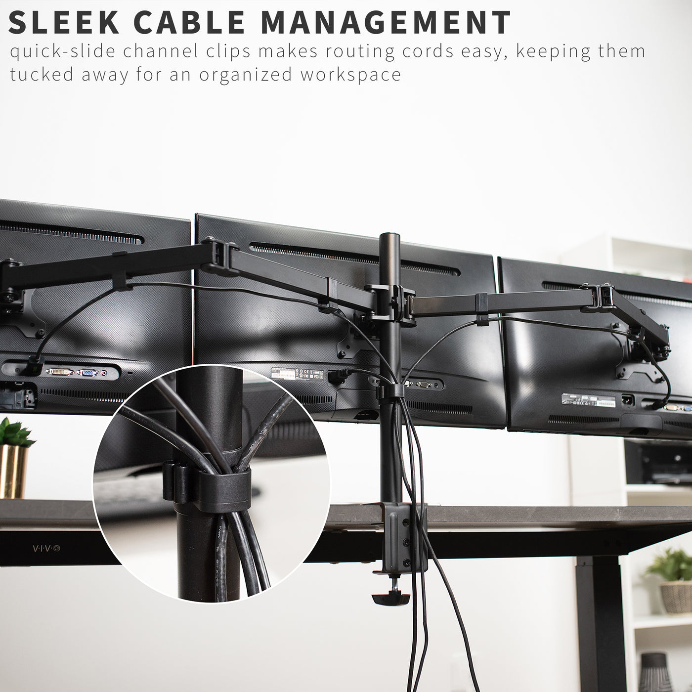 Sturdy height adjustable triple monitor desk mount with cable management.