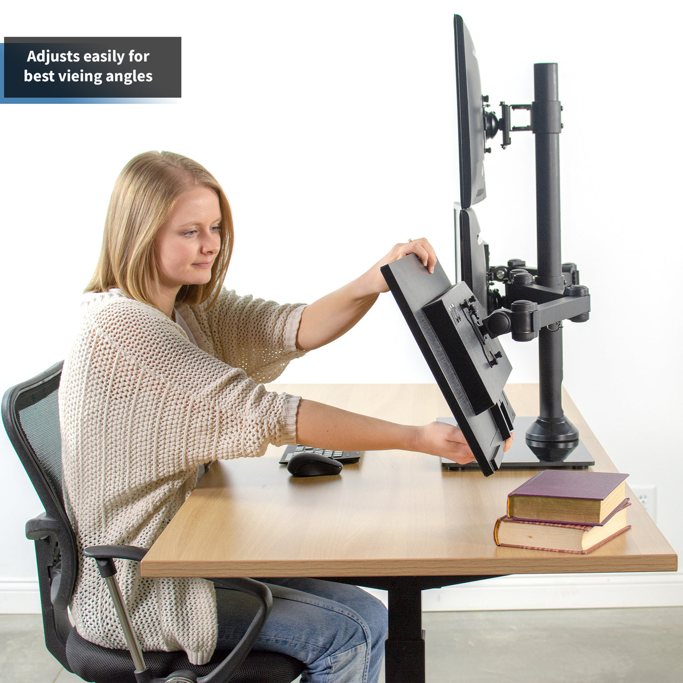 Sturdy height adjustable quad monitor desk stand.