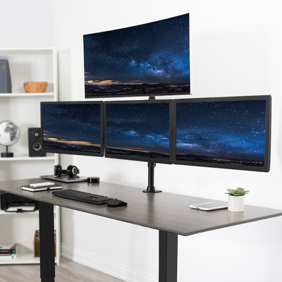 Sturdy height adjustable quad monitor desk stand.